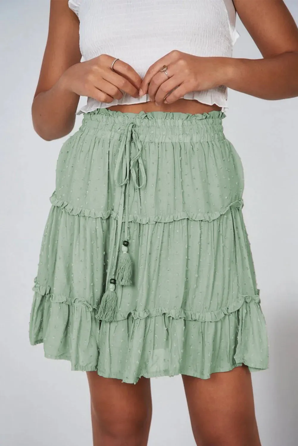 Sweets Tassle Mini Skirt in Sage